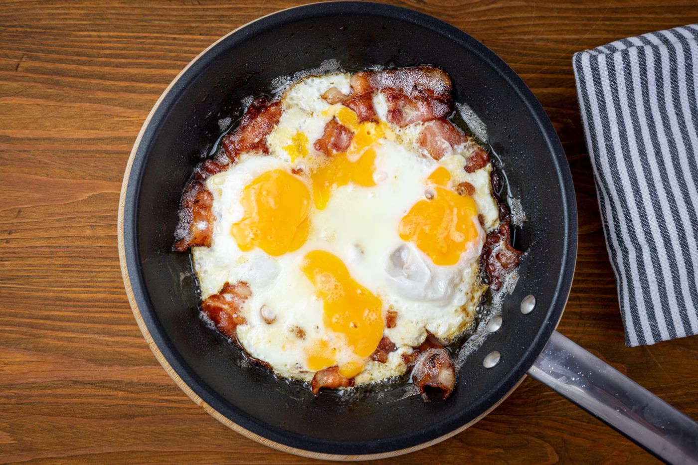 Bacon and eggs in a pan