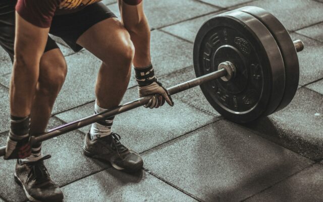 Person doing a strength workout, representing the P90X program